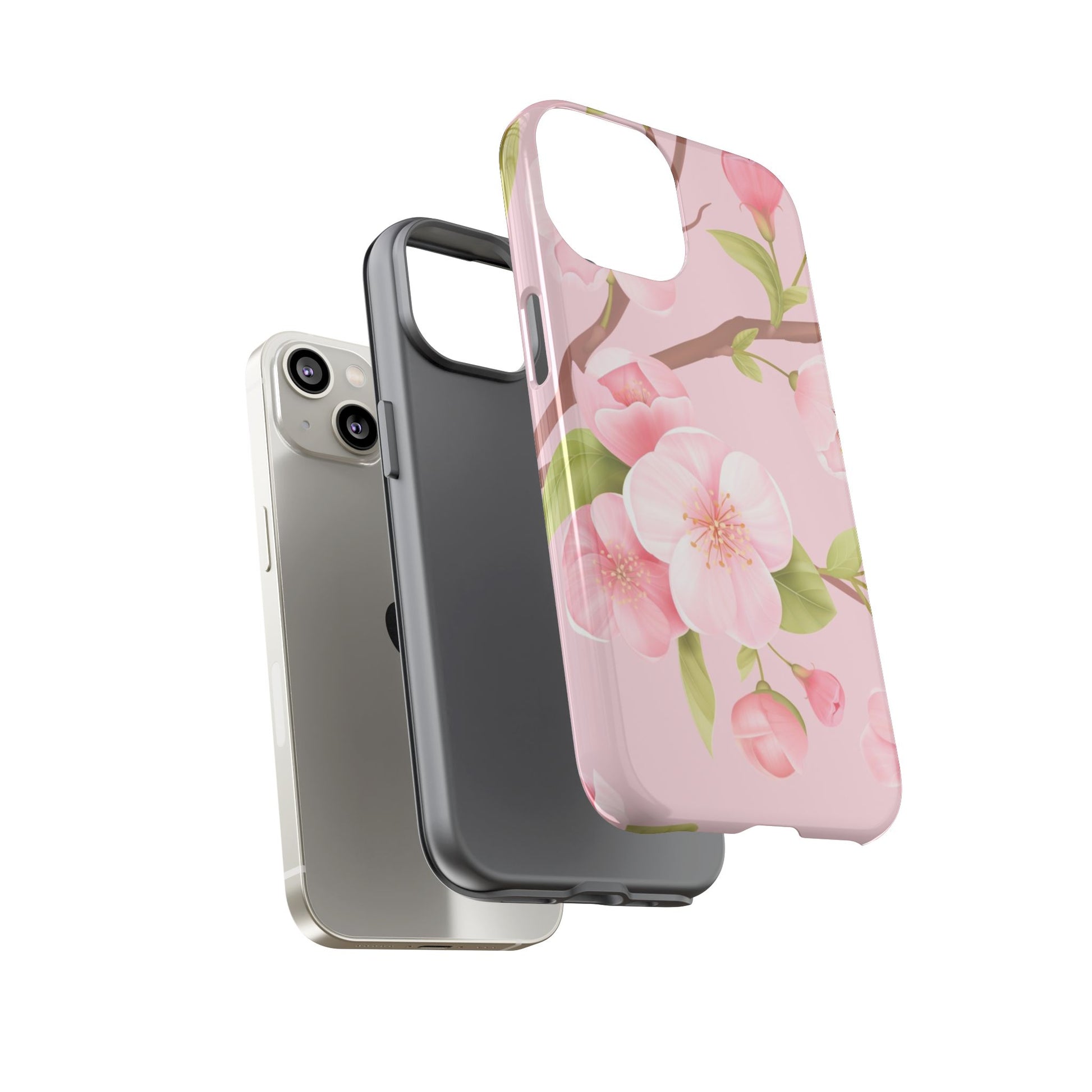 Phone cases, one floral pink, one black, and one silver, on a white background dual layers