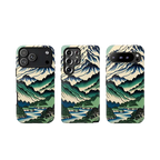 Three phone cases, iphone, samsung and google pixel models with mountain landscape design on a white background