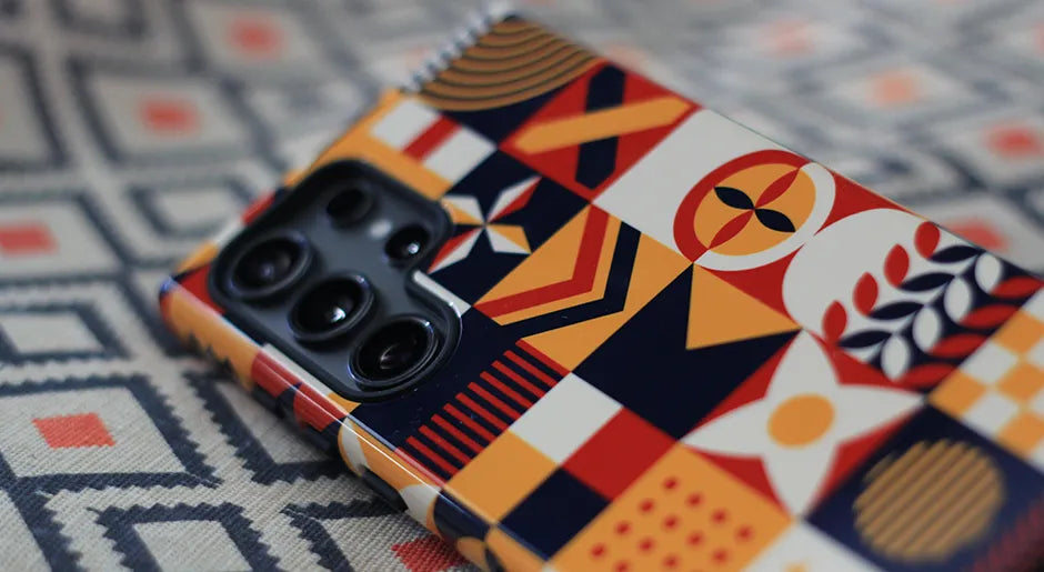 Samsung Galaxy S25 Ultra phone and case with colorful geometric-patterned phone case on a patterned background bought from MVB STUDIO official store.