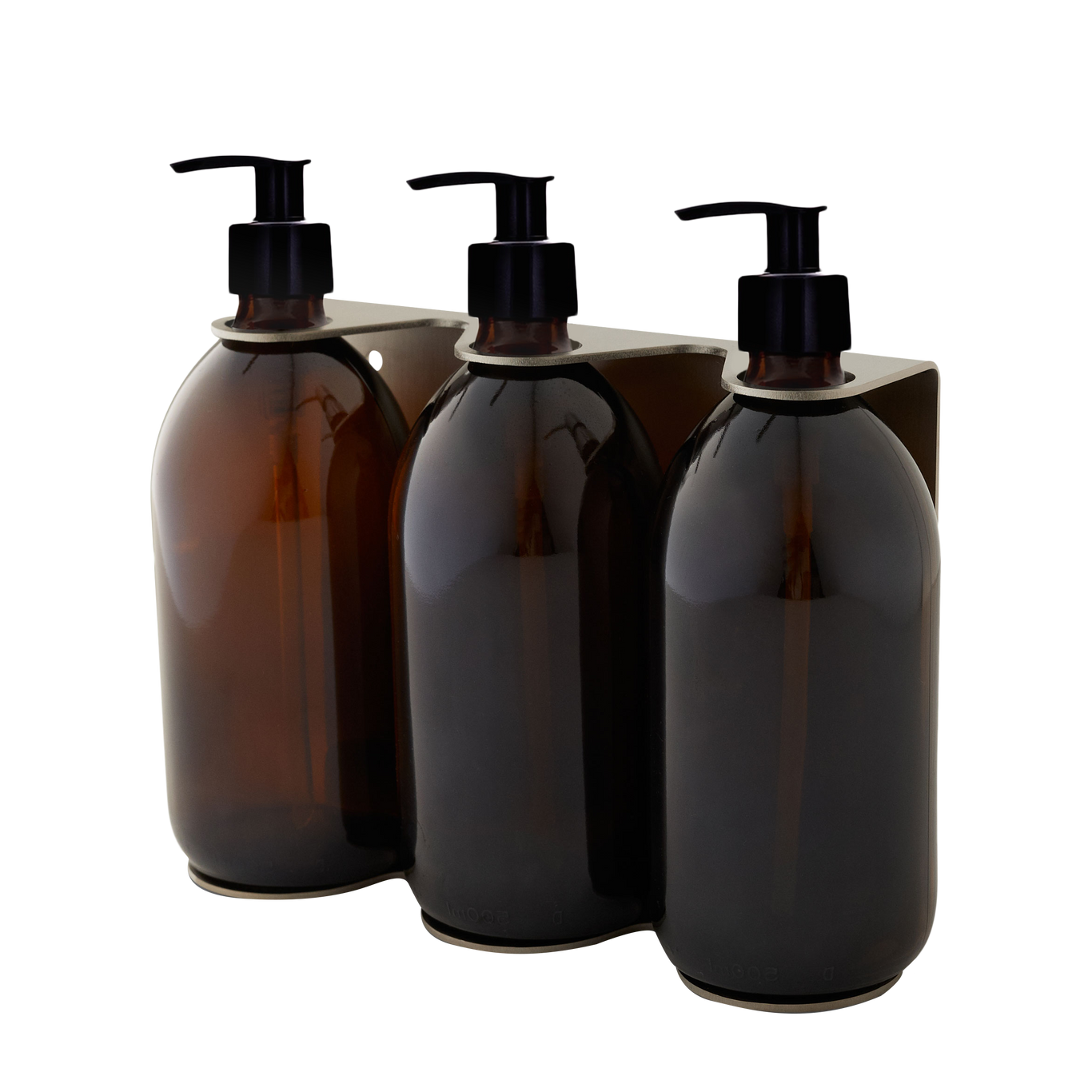 Three amber glass bottles with black pump dispensers on a white background