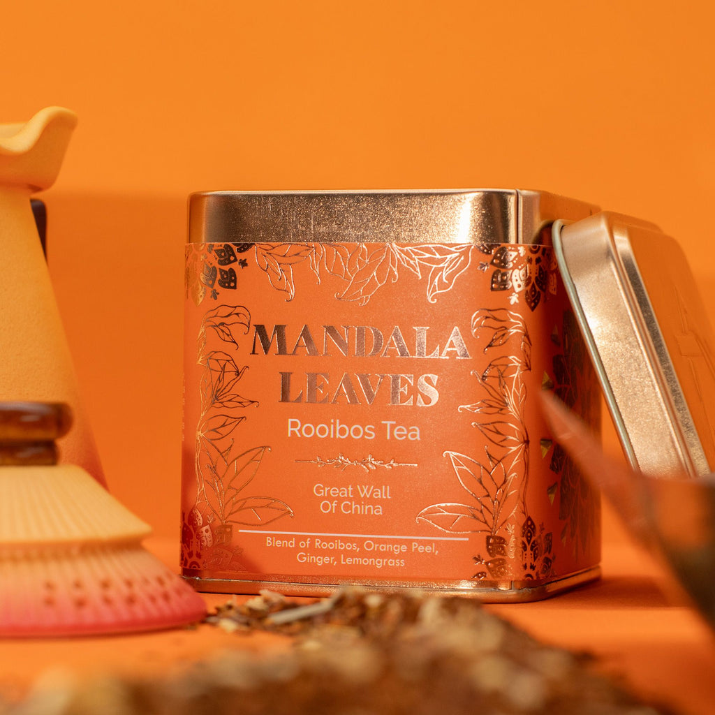 Mandala Leaves Rooibos Tea canister with decorative design on an orange background