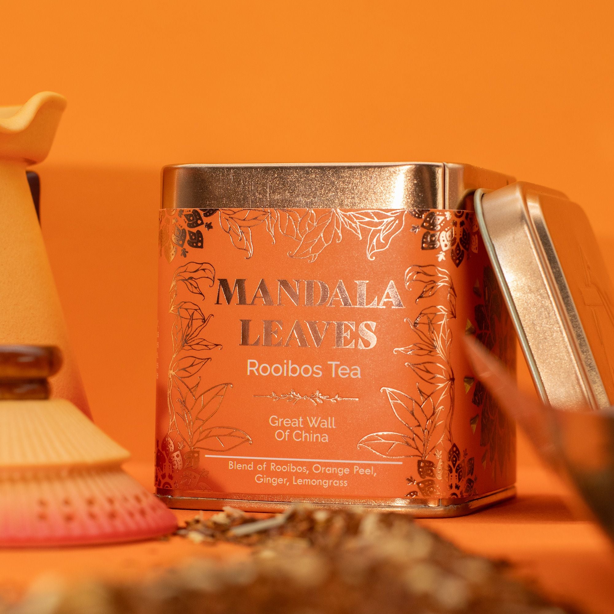 Mandala Leaves Rooibos Tea canister with decorative design on an orange background