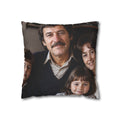 A square throw pillow featuring a printed family portrait of a man, woman, and two children, shown against a plain white background.