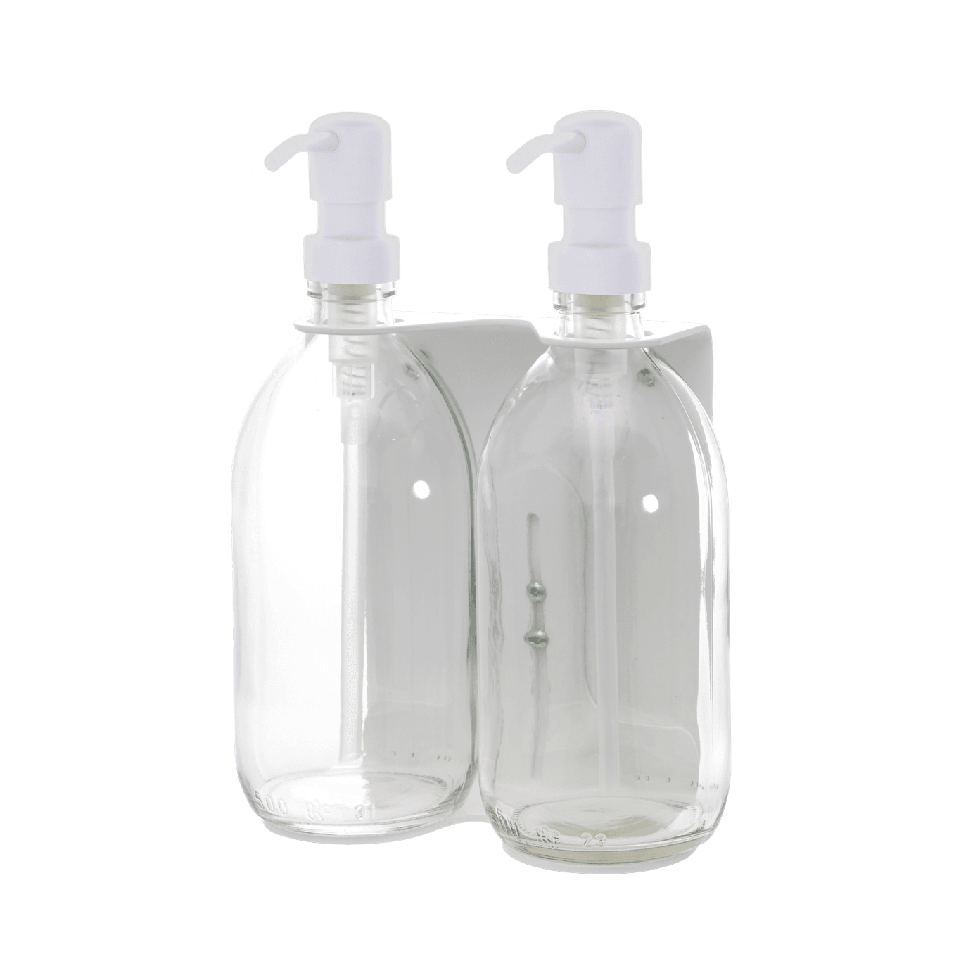 Two clear bottles with white pump dispensers on a dark blue background