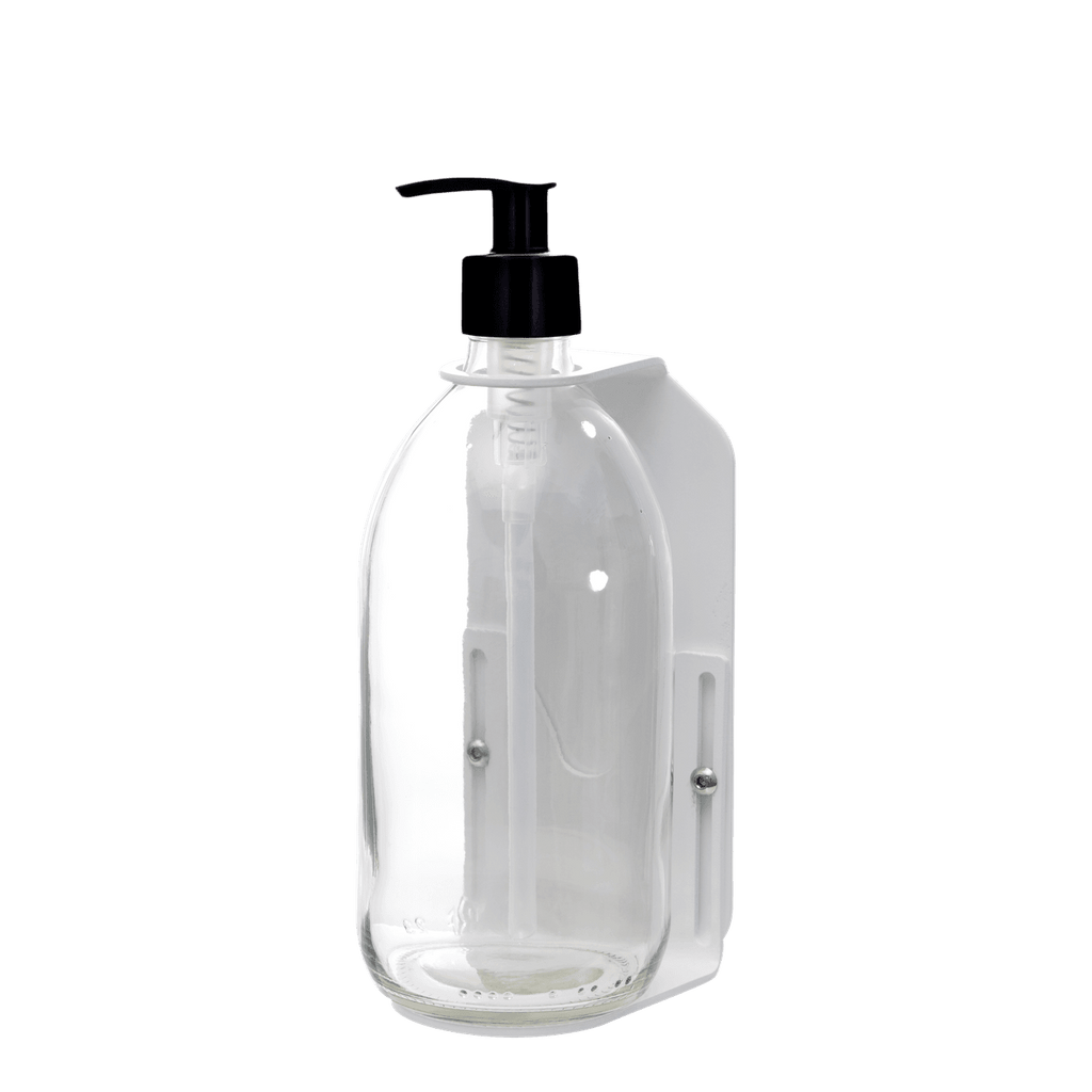 Clear plastic bottle with black pump on a dark gray background