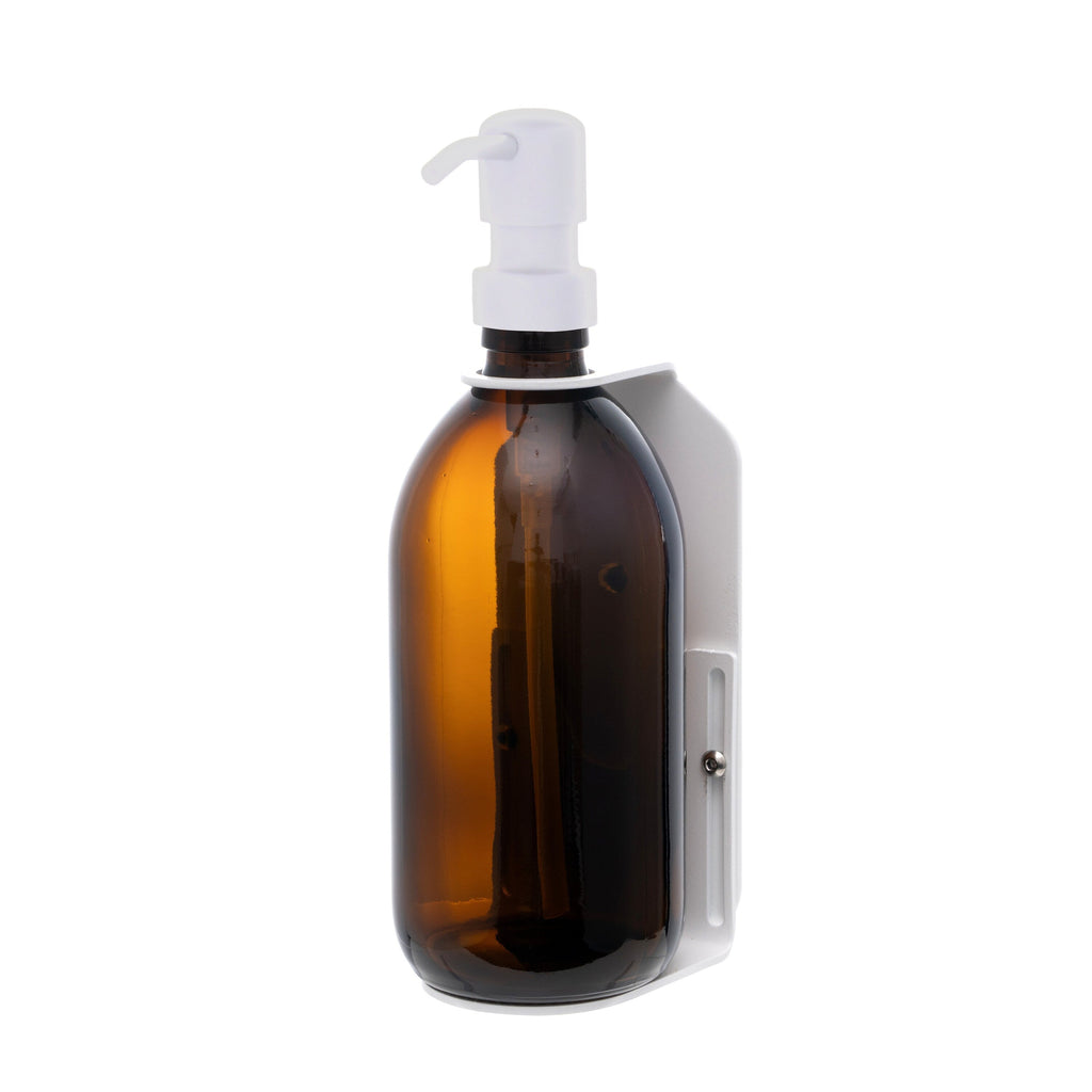 Brown bottle with a white pump on a white background