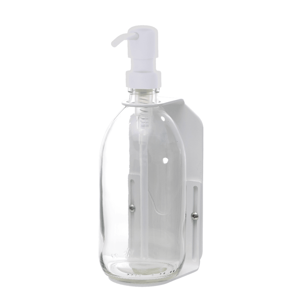 Clear plastic bottle with white pump on a dark gray background